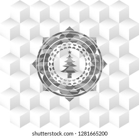 christmas tree icon inside realistic grey emblem with cube white background