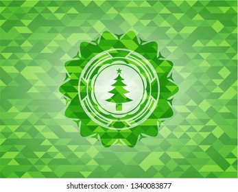 christmas tree icon inside realistic green mosaic emblem