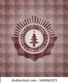 christmas tree icon inside red seamless badge with geometric pattern background.