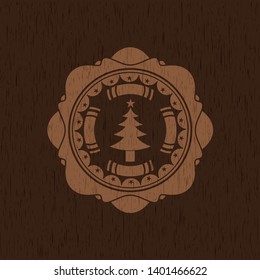 christmas tree icon inside retro wooden emblem