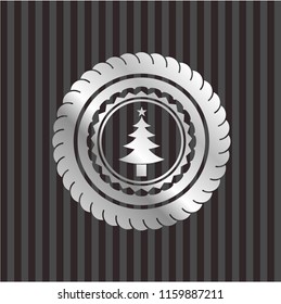 christmas tree icon inside silver emblem or badge