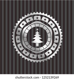 christmas tree icon inside silver shiny emblem