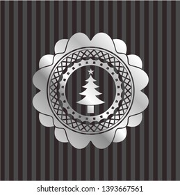 christmas tree icon inside silver badge or emblem