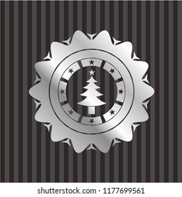 christmas tree icon inside silvery emblem