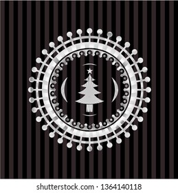 christmas tree icon inside silvery emblem or badge