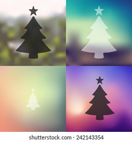 christmas tree icon on blurred background