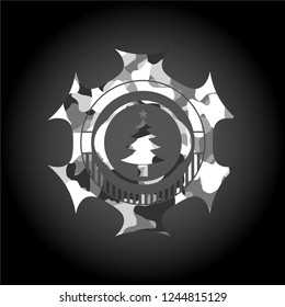 christmas tree icon on grey camouflage pattern
