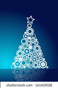 Christmas Tree Made Of Circles On A Blue Background