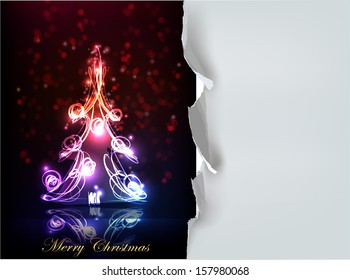 Christmas tree made of neon lights and ripped paper background