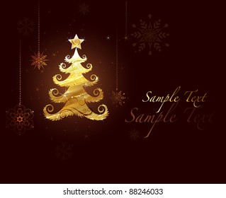 Christmas tree made out of textured gold foil, light on dark brown  background
