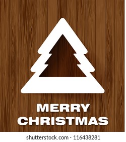 Christmas tree made ??of paper on a wooden background
