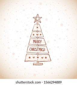 Christmas tree made of sawn wood board in vintage style. Simple rustic christmas decoration