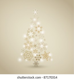 Christmas tree made from simple abstract golden snowflakes