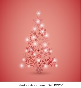 Árbol de Navidad hecho de copos de nieve rojos simples y abstractos
