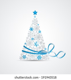 Christmas tree made from snowflakes with ribbon