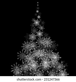Christmas tree made with snowflakes stream in the darkness