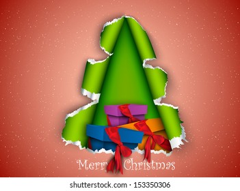 Christmas tree made of torn paper with gifts inside