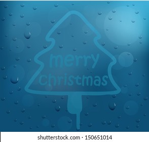 Christmas tree on glass window 