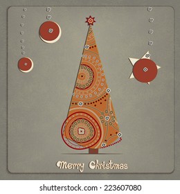 Christmas tree and ornaments on grey