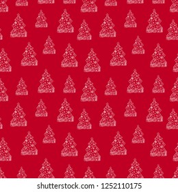 Christmas tree painted on a red background seamless pattern.