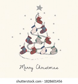 Christmas tree set with socks of different patterns with Merry Christmas greetings on light background.