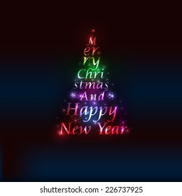 Christmas tree silhouette made of words and snowflakes.