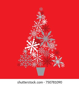 Christmas tree with snowflake design on red background