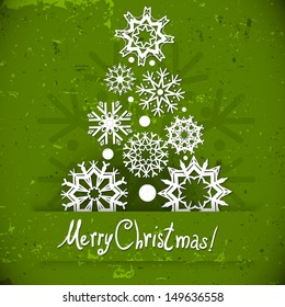 Christmas tree of snowflakes.  Vector greeting card 