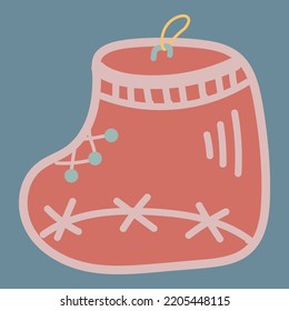 Jouet d'arbre de Noël en forme de botte rouge avec des éléments simples. Un style de dessin simple. Un modèle pour la décoration d'un intérieur de Nouvel An ou d'une carte postale. Illustration vectorielle isolée.