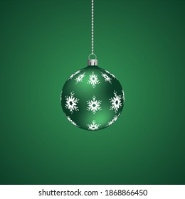 Christmas tree toy. Green glass ball. Ornament from snow-white snowflakes. Colored vector illustration. Isolated green background. The Christmas decoration is hung on a chain. Delicate decor.