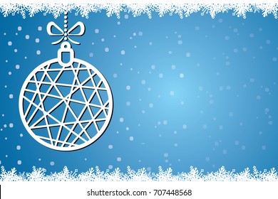 Christmas tree toy on the background of falling snow. Christmas card