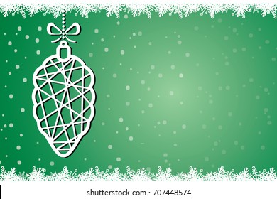 Christmas tree toy on the background of falling snow. Christmas card
