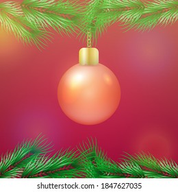Christmas tree toy on spruce branches. 