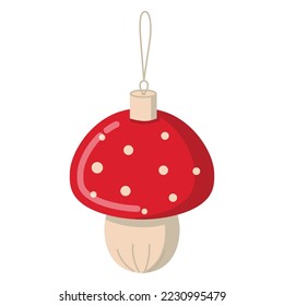 A Christmas tree toy in the shape of a fly agaric mushroom with a red cap and a beige stem.