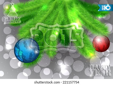 Christmas tree twigs with Christmas balls on a gray abstract background
