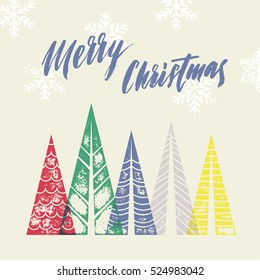 Christmas tree vector greeting card text lettering for merry holiday. Winter forest background with Merry Christmas modern calligraphic lettering with color fir pine trees in geometric shape