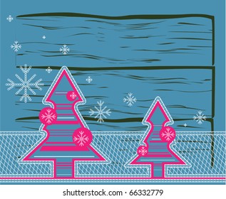 Christmas trees with the texture of embroidery on a background board
