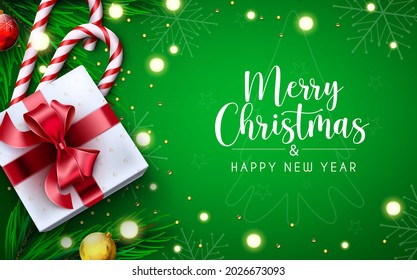 Diseño de fondo vectorial de Navidad. Feliz navidad en el espacio verde con regalo, caña de caramelo y elementos de navidad para la tarjeta de bienvenida de temporada de vacaciones. Ilustración del vector
