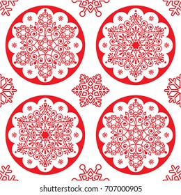 Christmas vector folk pattern - red snowflake mandala seamless design, Scandinavian style Xmas wallpaper, wrapping paper or textile 
 Repetitive snowflakes on white background, Swedish decoration 