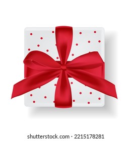 Christmas vector gift box and  with red bow and ribbon  isolated on white background.  realistic present box for greeting card, banner, poster. Top view