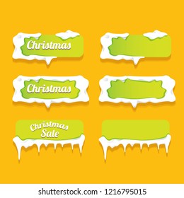 Christmas vector green glossy buttons set isolated on orange background. web green christmas sale buttons with snow, ice border