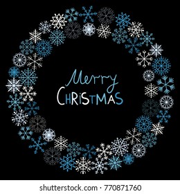 Christmas vector greeting card with circle snowflake design in blue and white on black background