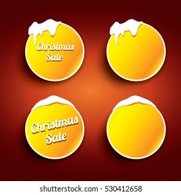 Christmas vector orange glossy buttons set on classic red background. web orange christmas sale buttons with snow, ice border and christmas text