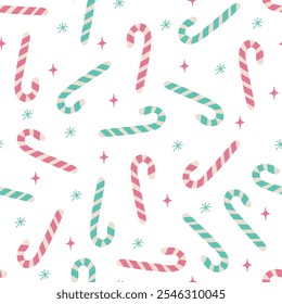 Christmas vector pattern with pink and blue candy canes, snowflakes and stars. New year sweets on white background