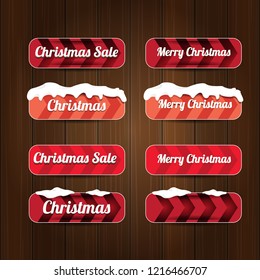 Christmas vector red glossy buttons set isolated on vintaeg wooden sign background. web red christmas sale buttons with snow, ice border