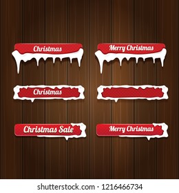 Christmas vector red glossy buttons set isolated on vintaeg wooden sign background. web red christmas sale buttons with snow, ice border