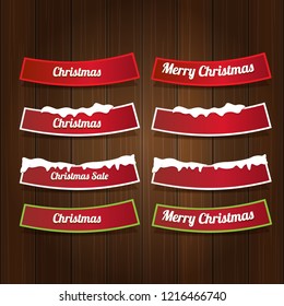 Christmas vector red glossy buttons set isolated on vintaeg wooden sign background. web red christmas sale buttons with snow, ice border