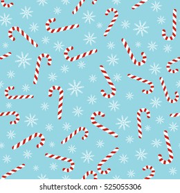 Christmas vector seamless blue pattern with candy canes and snowflakes. Background for wrapping paper, fabric print, greeting cards design