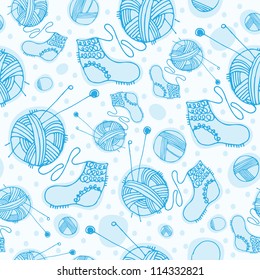 Christmas vector seamless pattern with ball of threads and socks