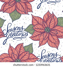 Christmas vector seamless pattern with blooming poinsettia and hand lettering